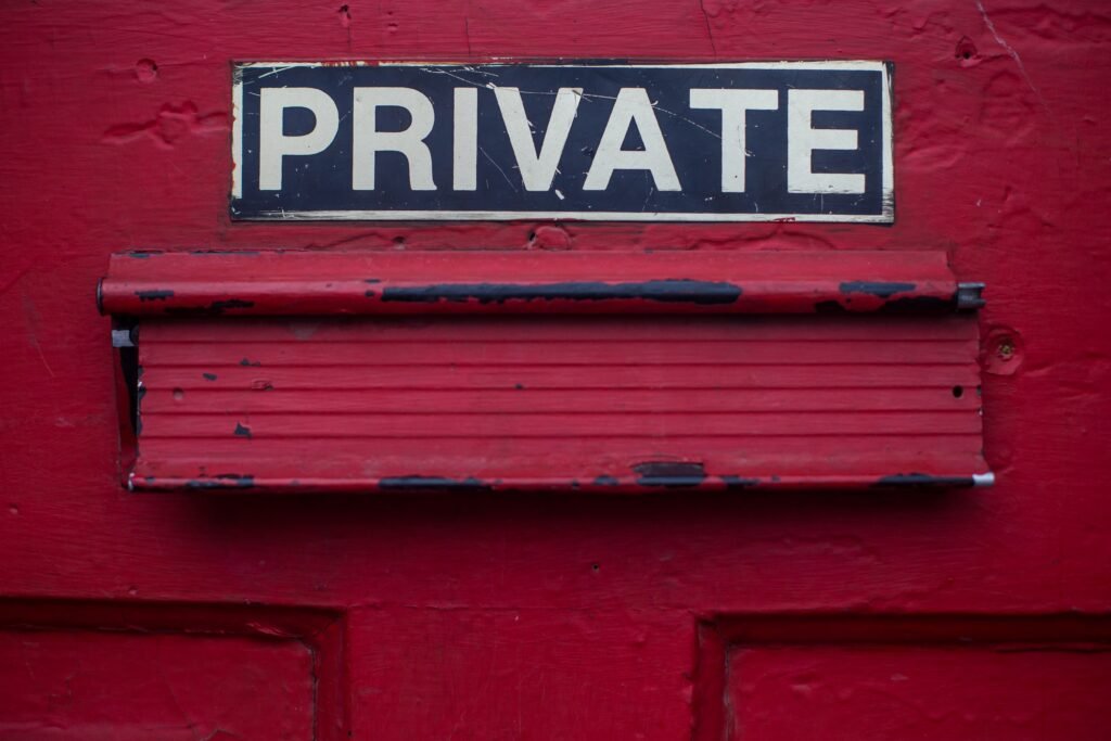 Red wall with big private sign