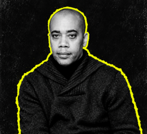 Carl Craig in a black-and-white artist portrait with a bright yellow cutout outline.
