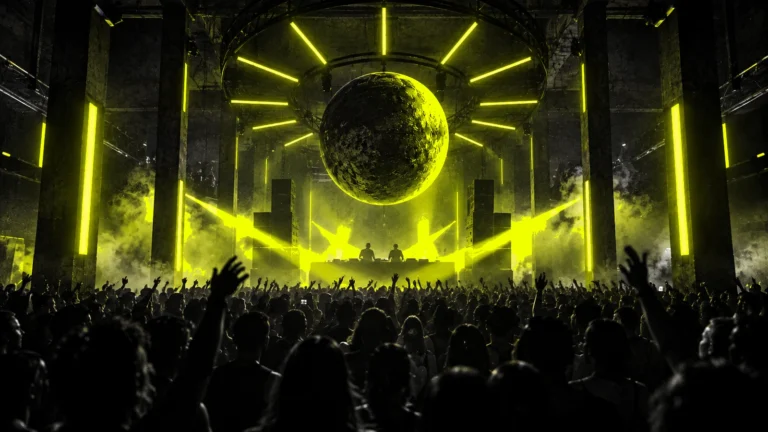 Silhouetted dancers at an underground techno party with a central DJ booth, industrial pillars and acid-yellow lights.