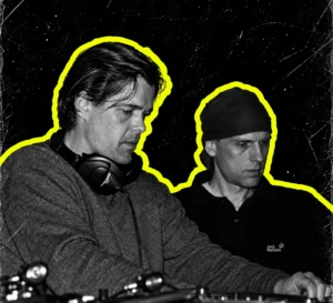 Basic Channel duo at DJ equipment, in black and white with bold yellow cutout outlines.